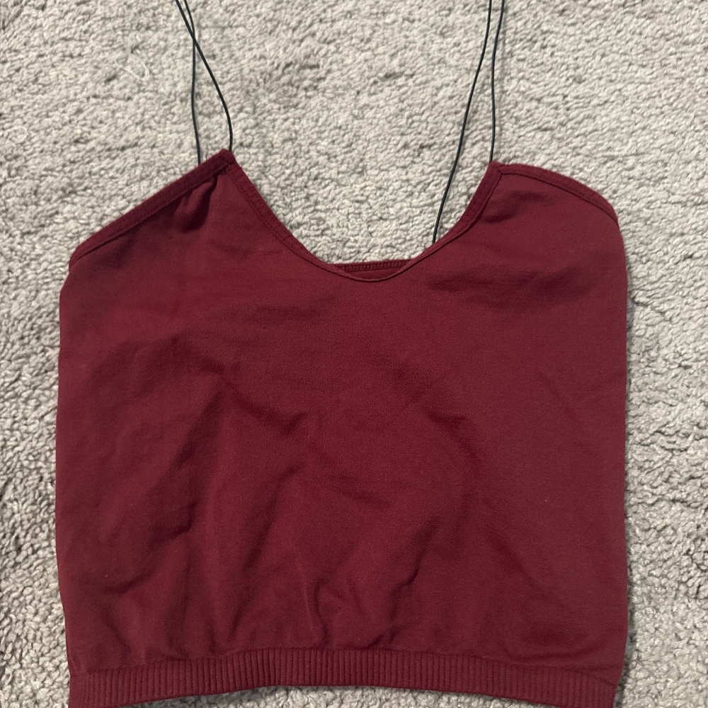 red cropped tank top with black straps